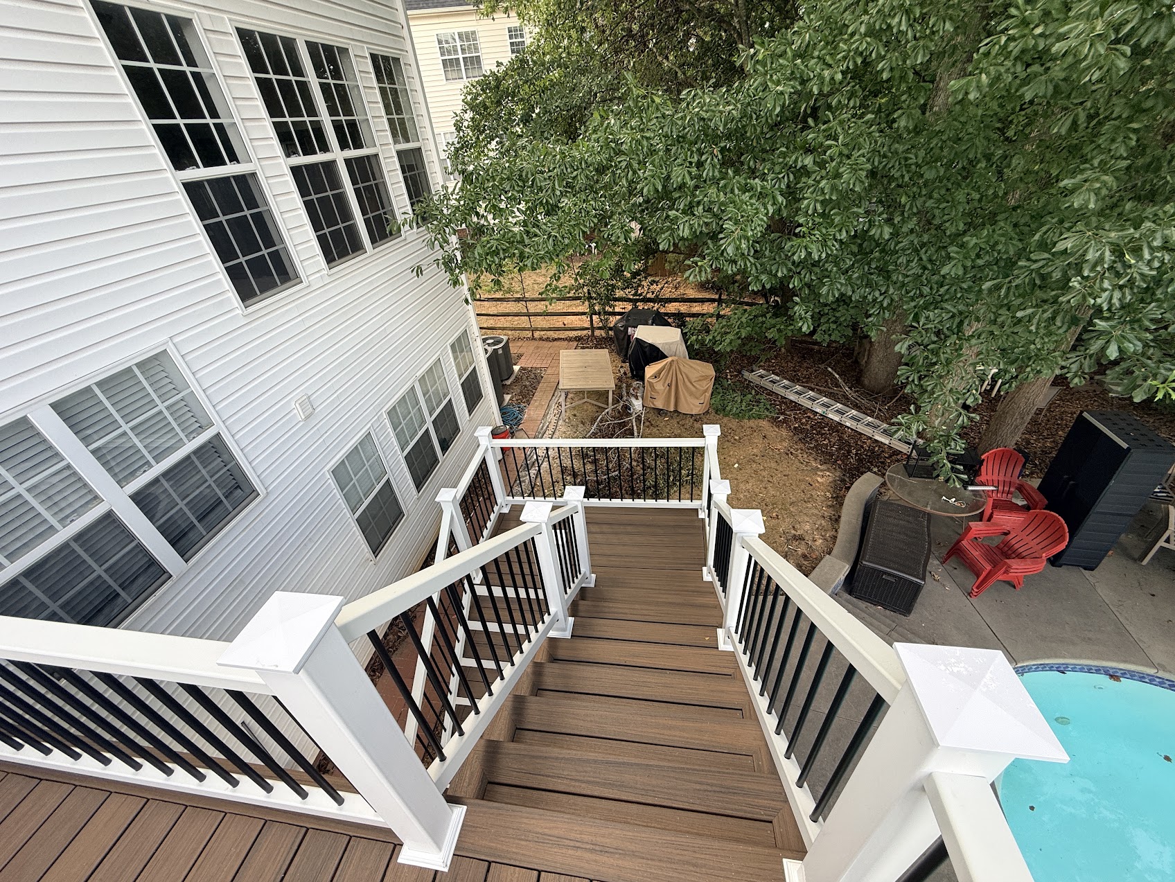 Deck stairs after composite decking and new railing by JeDi Works Charlotte NC
