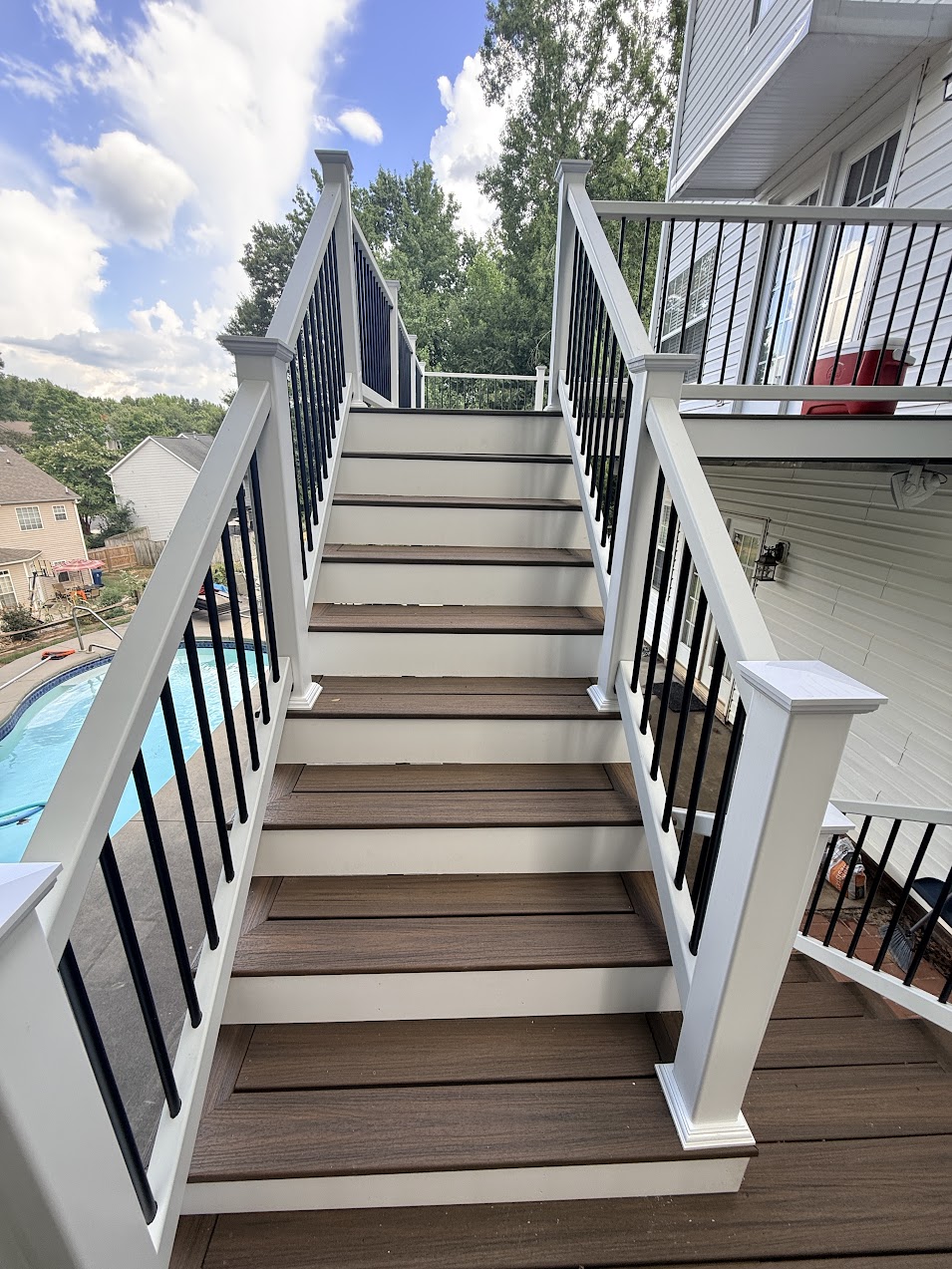 Pool deck stairs after composite renovation by JeDi Works Charlotte NC